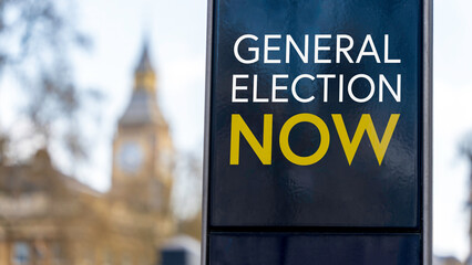 General Election Now written on a sign with Elizabeth Tower and Big Ben in the background