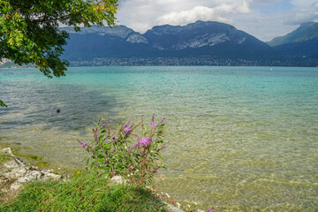Annecy lake in France with turquoise water, mountains and peaceful beauty
