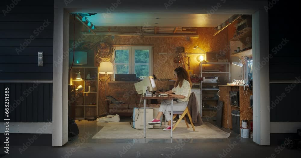 Aufkleber hispanic female software developer programming on old desktop computer in retro garage in the evenin