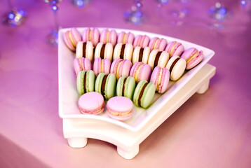  Colorful macaron stack on a white plate