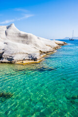 Rocky beach of Sarakiniko with crystal clear sea water bay, Milos island, Cyclades, Greece - 663262511