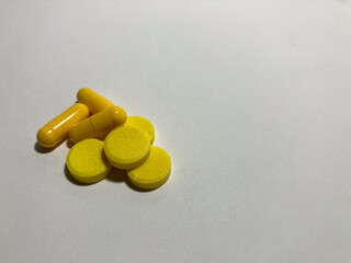 yellow tablets on a white background