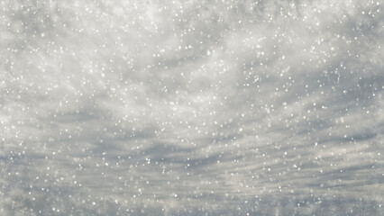 pretty snowy weather on clouds on sky bg - photo of nature