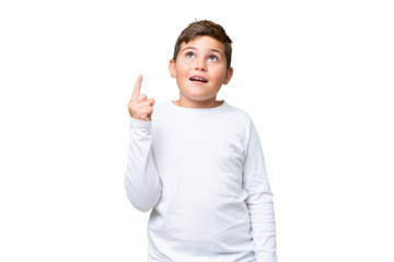 Little caucasian kid over isolated chroma key background pointing up and surprised