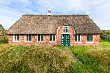 Fototapeta na wymiar Typical thatched-roof cottage of Sønderho, Denmark