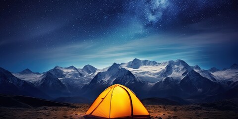 A tent in the mountains under the starry sky. - obrazy, fototapety, plakaty
