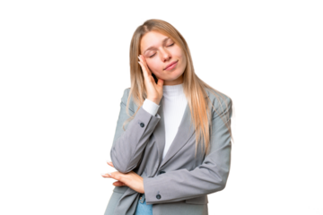 Young pretty blonde woman over isolated chroma key background with headache