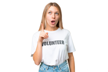 Young volunteer woman over isolated chroma key background thinking an idea pointing the finger up