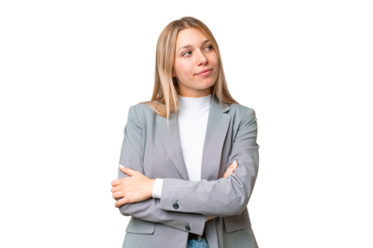 Young pretty blonde woman over isolated chroma key background keeping the arms crossed