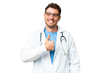 Brazilian doctor man over isolated chroma key background giving a thumbs up gesture