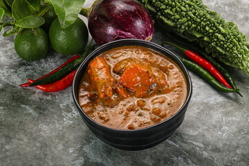 Indian cuisine - chicken curry with spices
