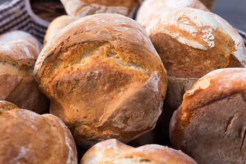 Ruddy rolls of fresh warm grain bread