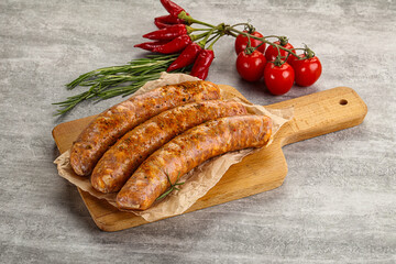 Raw sausages with spices and herbs