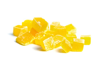 Dried mango cubes isolated on white background. Diced mango closeup. Heap of sweetened fruits. Nature's Candy