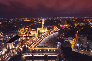 Fototapeta na wymiar Oradea romania tourism aerial a mesmerizing nighttime view of a historic European city, showcasing its iconic attractions and rich heritage