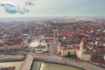 Obraz premium Aerial art nouveau historical a beautiful cityscape with a river flowing through the heart of Oradea, showcasing its rich history and stunning art nouveau architecture incity Oradea, Bihor, Romania