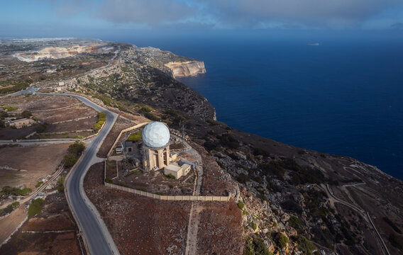 Aerial view of a meteorological station on the cliff along the coastline, Dingli, Malta.