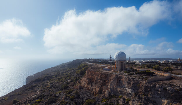 Aerial view of a meteorological station on the cliff along the coastline, Dingli, Malta.