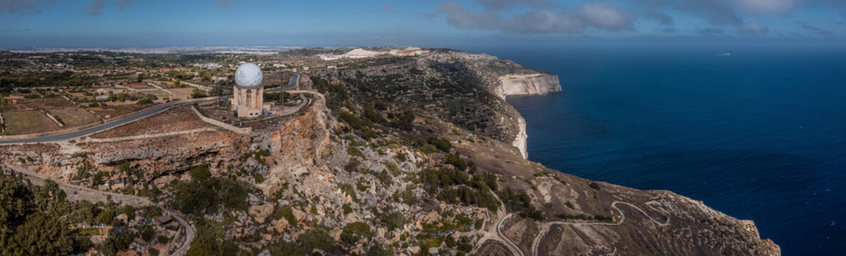 Aerial view of a meteorological station on the cliff along the coastline, Dingli, Malta.
