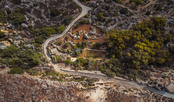 Aerial view of a road along the cliff in Dingli, Malta.