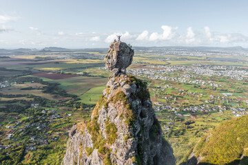 Aerial view of a person on the top of the Pieter Both mountain peak, Malenga, Pamplemousses, Mauritius.