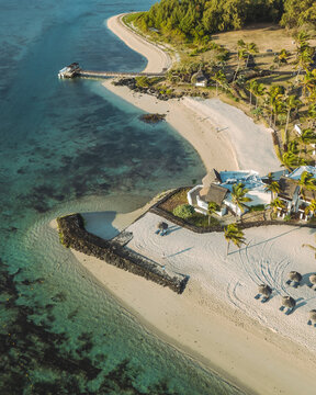 Aerial view of a beautiful beach along the coast in Ilot Lievres, Flacq, Mauritius.