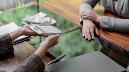 Business people signing contract making deal with real estate agent Concept for consultant home insurance.Real estate investment Property insurance security.