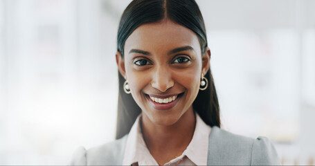 Business woman, portrait and smile on face in an office with confidence and career pride....