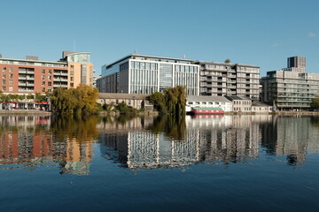 Fototapeta premium Modern part of Dublin Docklands, known as Silicon Docks, in warm autumn day