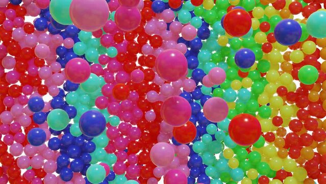 Multi-colored glossy balls fall from above and fill the screen. 3d render