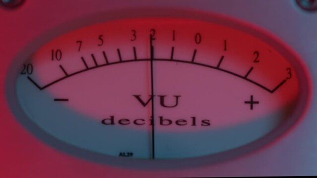 Recording Studio Analog Compressor Meter, close-up showing the needle bouncing from a vocal recording.