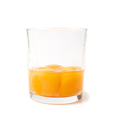 Broken Egg in Glass Isolated, Raw Yolk and White, Cracked Brown Shell, Fresh Broken Organic Chicken Eggs