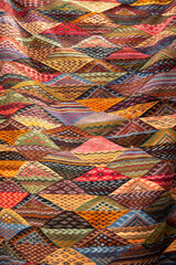 Colorful woolen Berber carpet close in Morocco
