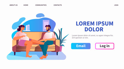 happy pregnant woman future mom with her partner sitting together on sofa pregnancy motherhood expectation concept