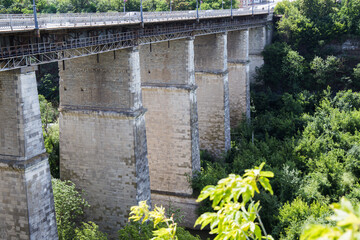 a large stone bridge across the river
