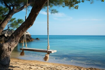 A tree suspended wooden swing with a backdrop of the azure sea