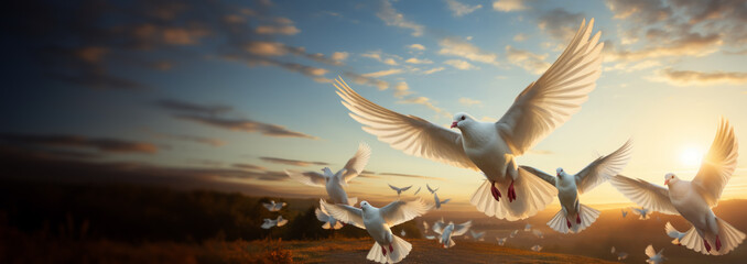 white doves, a symbol of love and peace, fly through the clouds in the blue sky. view of the sky from below.Sun shining.  - obrazy, fototapety, plakaty