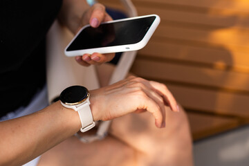 Hand holding the phone in front view and the finger pointing at the screen for mockup concept