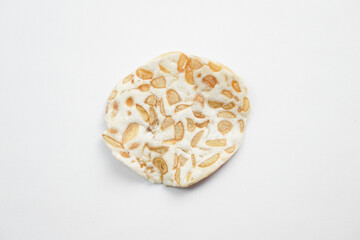 Keripik Tempe or Tempeh Chips are made from soybeans mixed with rice flour then sliced ​​thinly. Isolated on white background.