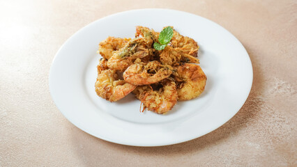 Crispy Shrimp on a white plate. Top angle.
