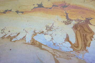 Crude oil or dirty fluid is drainage into the public water place, it floating on the water surface. Industrial pollution and environmental impact scene. Selective focus.