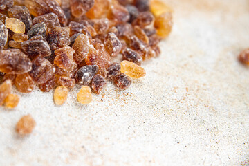 dessert rock sugar crystals pieces sweet candy brown sugar candied big rock caramel taste cane sugar cooking appetizer meal food snack on the table copy space food background rustic top view