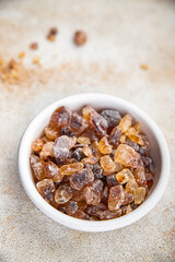 dessert rock sugar crystals pieces sweet candy brown sugar candied big rock caramel taste cane sugar cooking appetizer meal food snack on the table copy space food background rustic top view