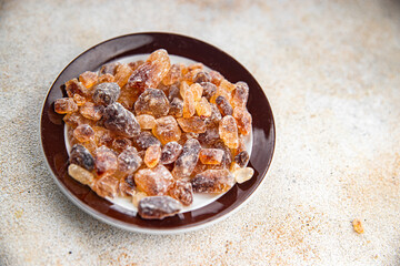 dessert rock sugar crystals pieces sweet candy brown sugar candied big rock caramel taste cane sugar cooking appetizer meal food snack on the table copy space food background rustic top view