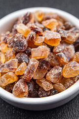 dessert rock sugar crystals pieces sweet candy brown sugar candied big rock caramel taste cane sugar cooking appetizer meal food snack on the table copy space food background rustic top view