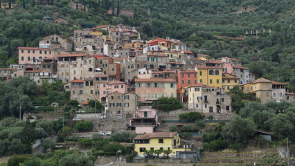 Fototapeta na wymiar The view of Isolalunga in Imperia from the road, Italy, in the month of May