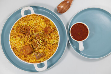 Mutton Hyderabadi Biryani: A Flavorful Journey into Culinary Excellence. Mutton Hyderabadi Biryani at its finest, where tender pieces of mutton are embraced by fragrant rice