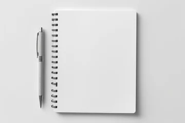 Foto op Canvas blank notebook with pen © Robotoyo