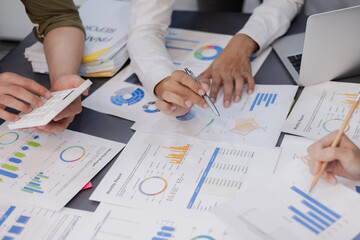 Business Data Analytics Concept. Team of hands with business data analytics plan marketing,...