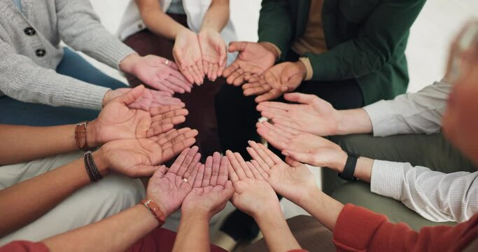 Group, palm or hands in circle for support, prayer or solidarity with faith, trust and hope in meeting. Men, closeup or women praying for mental health in team building with mindfulness or wellness